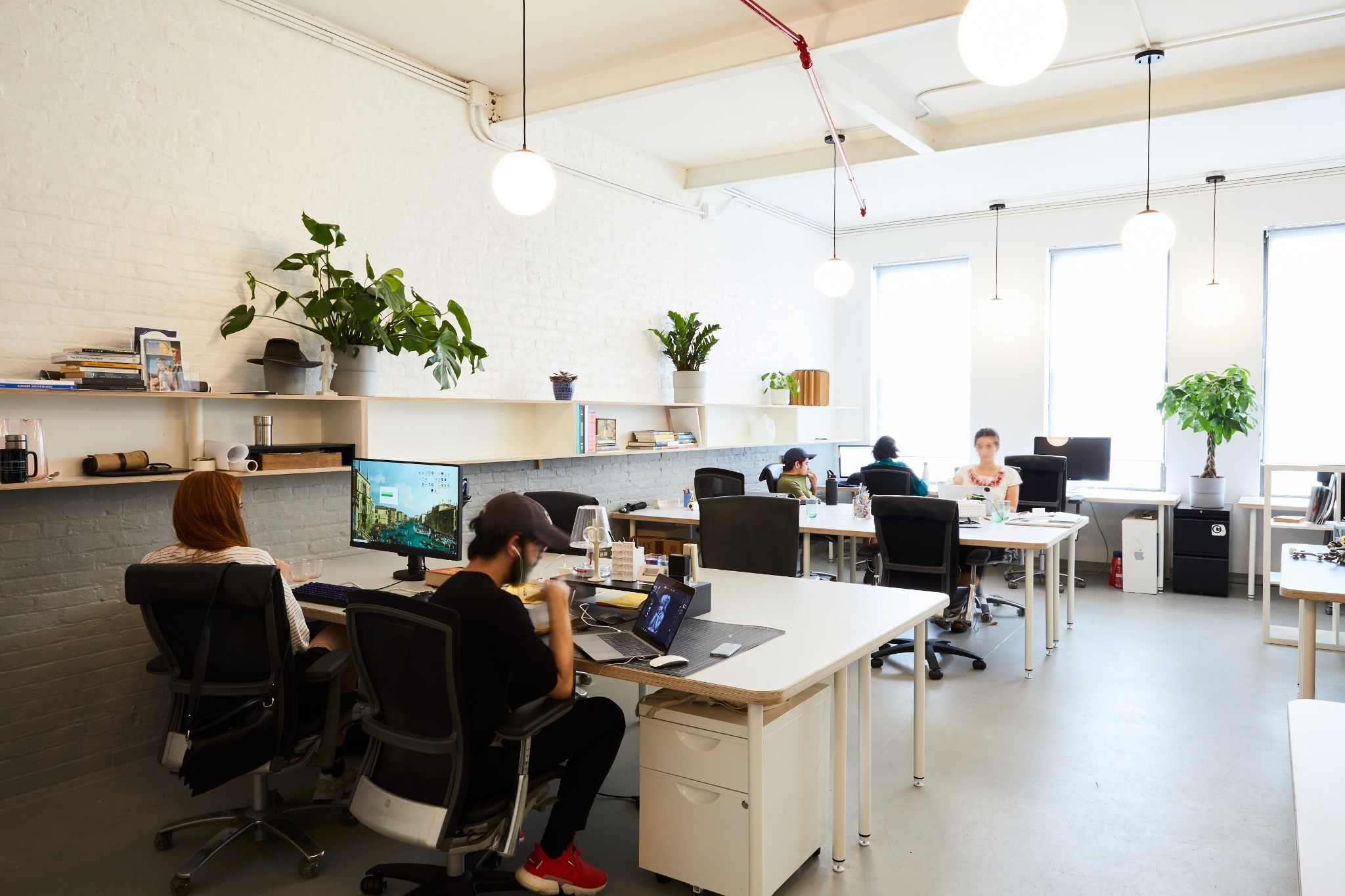 Members working at their desks